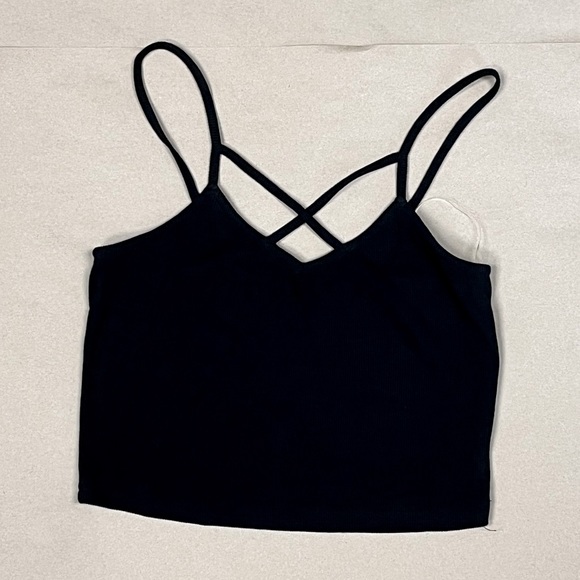 Black cross-cross crop top with spaghetti straps. Slightly stretchy. - Picture 1 of 4